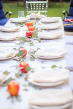 Formal Thanksgiving table setting in the fall family group tradition Stock Photos