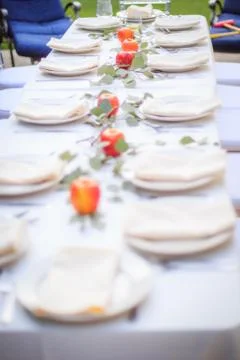 Formal Thanksgiving table setting in the fall family group tradition Stock Photos
