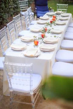 Formal Thanksgiving table setting in the fall family group tradition Stock Photos