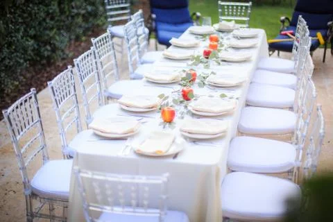 Formal Thanksgiving table setting in the fall family group tradition Stock Photos