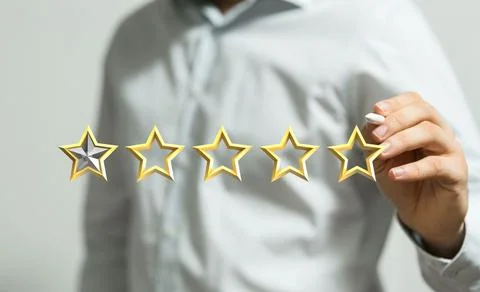 Formally dressed person pointing with a white pen to 3D rendered low star rating Stock Illustration