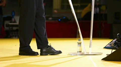 Formaly Clothed Speaker Being on the Stage Stock Footage 68621901