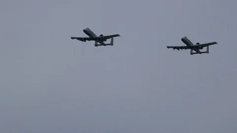 Formation of A-10 Thunderbolt II 'Warthogs' at the Fort Wayne Airshow Stock Footage 111588314