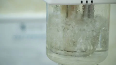 Formation of air bubbles during the boiling of water Stock Footage 195301655
