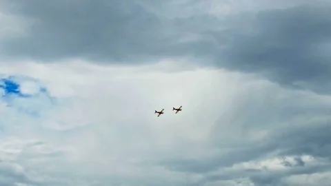 Formation of airplanes in the sky Stock Footage 76004084