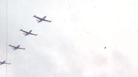 Formation of American subsonic jet trainer aircraft in flight in a 1950s airshow Stock Footage 169089653
