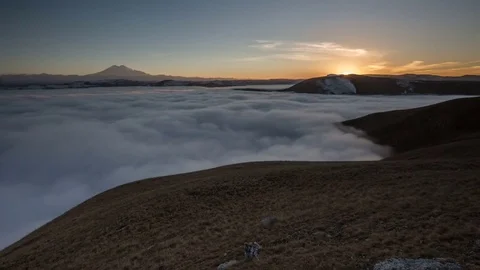 The formation and movement of clouds above the volcano Elbrus Stock-Footage 70152122