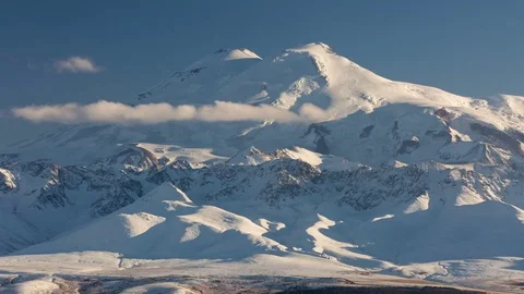 The formation and movement of clouds above the volcano Elbrus Stock Footage 70152672
