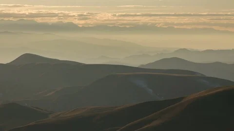 The formation and movement of clouds above the volcano Elbrus Stock Footage 70153100