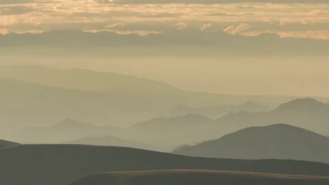 The formation and movement of clouds above the volcano Elbrus Stock Footage 70154056