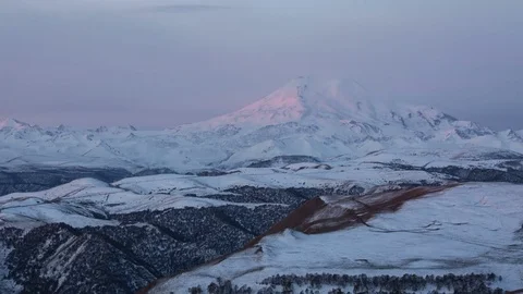 The formation and movement of clouds above the volcano Elbrus Stock Footage 70188565