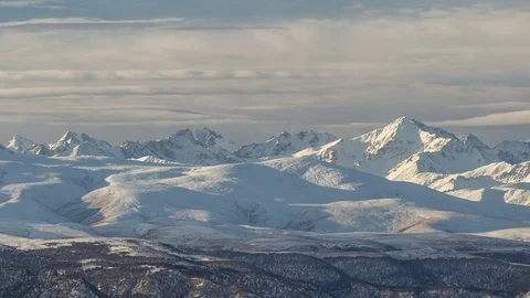 The formation and movement of clouds above the volcano Elbrus Stock Footage 70190913