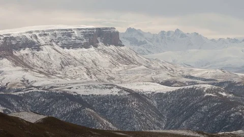 The formation and movement of clouds above the volcano Elbrus Stock Footage 70300485