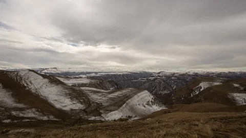 The formation and movement of clouds above the volcano Elbrus Stock Footage 70300492
