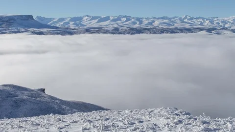 The formation and movement of clouds above the volcano Elbrus Stock Footage 70408405