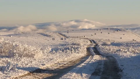 The formation and movement of clouds above the volcano Elbrus Stock Footage 70409081