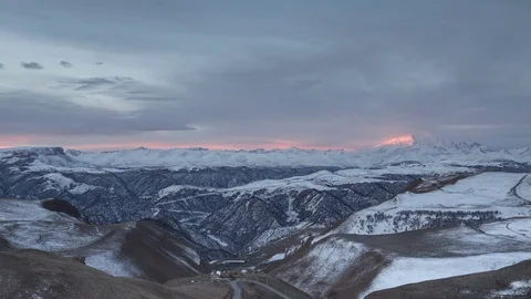 The formation and movement of clouds above the volcano Elbrus Stock Footage 70457563