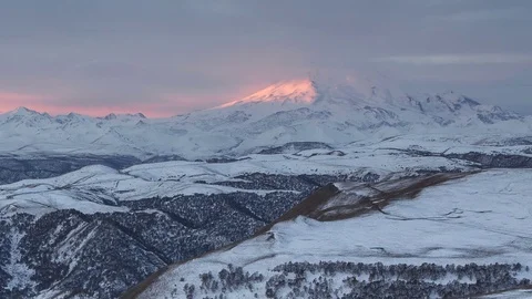 The formation and movement of clouds above the volcano Elbrus Stock Footage 70457576