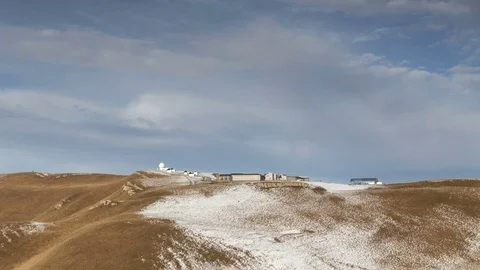 The formation and movement of clouds above the volcano Elbrus Stock Footage 70487666