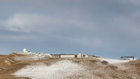 The formation and movement of clouds above the volcano Elbrus Stock Footage 70487718