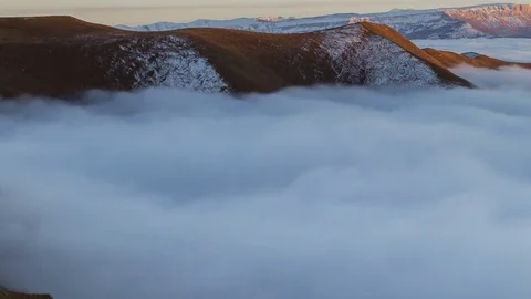 The formation and movement of clouds above the volcano Elbrus Stock Footage 70500812
