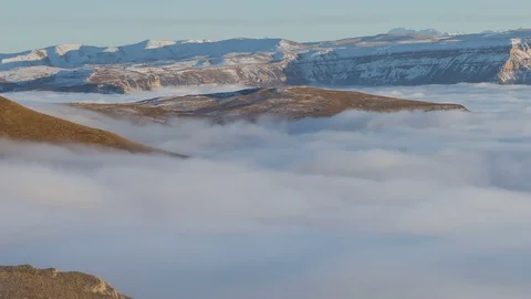 The formation and movement of clouds above the volcano Elbrus Stock Footage 70500931
