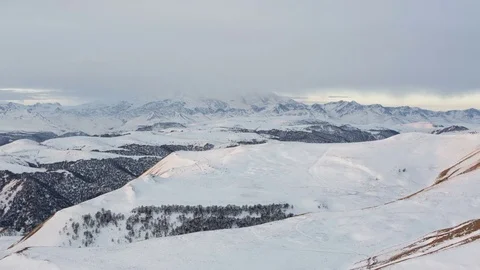 The formation and movement of clouds above the volcano Elbrus Stock Footage 72587870