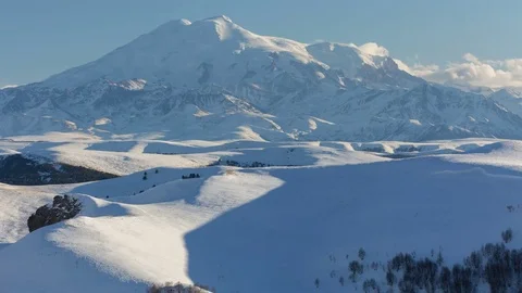 The formation and movement of clouds above the volcano Elbrus Stock Footage 72588884