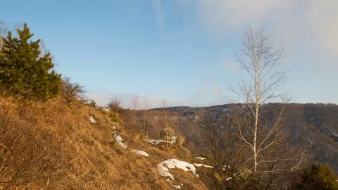 The formation and movement of clouds above the volcano Elbrus Stock Footage 72589306