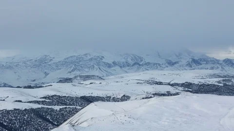 The formation and movement of clouds above the volcano Elbrus Stock Footage 72589429