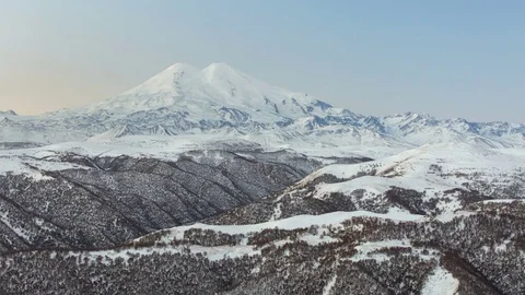 The formation and movement of clouds above the volcano Elbrus Stock Footage 72613989