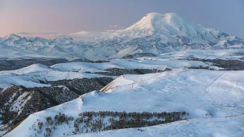 The formation and movement of clouds above the volcano Elbrus Stock Footage 72617013