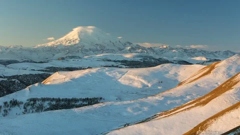 The formation and movement of clouds above the volcano Elbrus Stock Footage 72617821