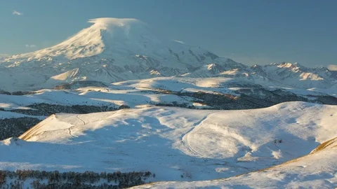 The formation and movement of clouds above the volcano Elbrus Stock Footage 72618170