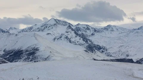 The formation and movement of clouds above the volcano Elbrus Stock Footage 72618455