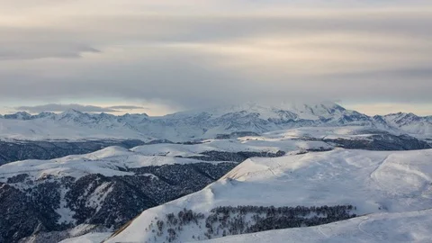 The formation and movement of clouds above the volcano Elbrus Stock Footage 72627598