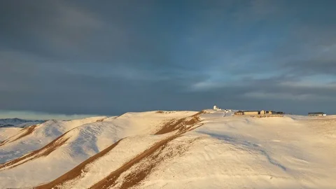 The formation and movement of clouds above the volcano Elbrus Stock Footage 73982687