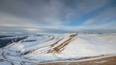 The formation and movement of clouds above the volcano Elbrus Stock Footage 73985708