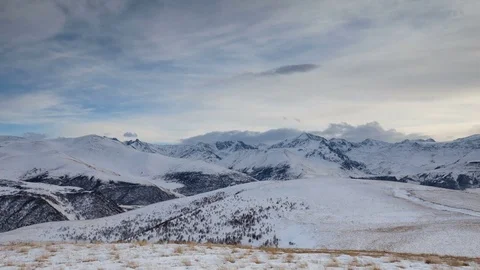 The formation and movement of clouds above the volcano Elbrus Stock Footage 74067467