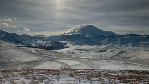 The formation and movement of clouds above the volcano Elbrus Stock Footage 74068182
