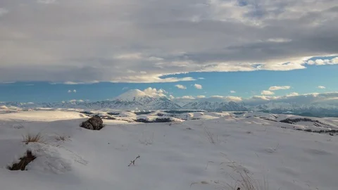 The formation and movement of clouds above the volcano Elbrus Stock Footage 74074350