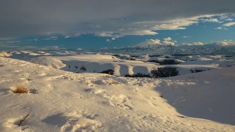The formation and movement of clouds above the volcano Elbrus Stock Footage 74074737