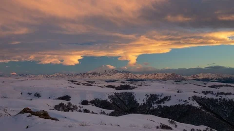 The formation and movement of clouds above the volcano Elbrus Stock Footage 74075226