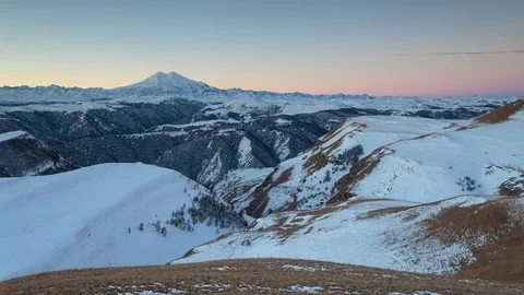 The formation and movement of clouds above the volcano Elbrus Stock Footage 74104167