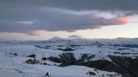 The formation and movement of clouds above the volcano Elbrus Stock Footage 74106199