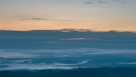 The formation and movement of clouds over the summer slopes of Bolshoy Thach Stock Footage 83493472