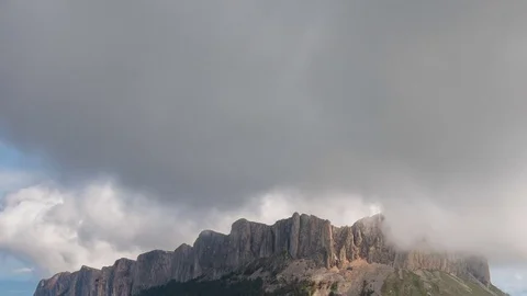 The formation and movement of clouds over the summer slopes of Bolshoy Thach Stock Footage 83493500