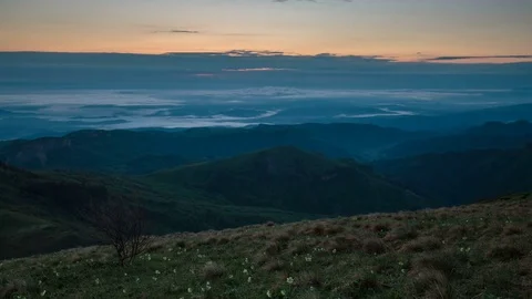 The formation and movement of clouds over the summer slopes of Bolshoy Thach Stock Footage 83594567