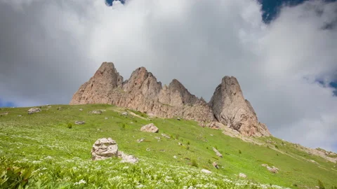 The formation and movement of clouds over the summer slopes of Mountains Stock Footage 149353334