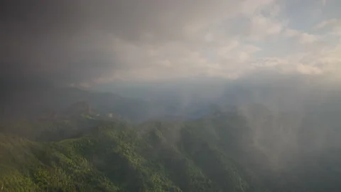 The formation and movement of clouds over the summer slopes of Mountains Stock Footage 149353404